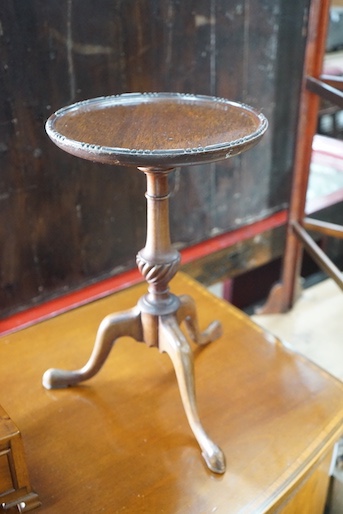 A George III style yew serpentine toilet mirror, height 64cm, together with a Victorian folding towel rail and a mahogany tripod wine table